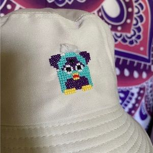 Furby hat. Hand stitched. Polyester hat. Crown measurement: 22.8 in